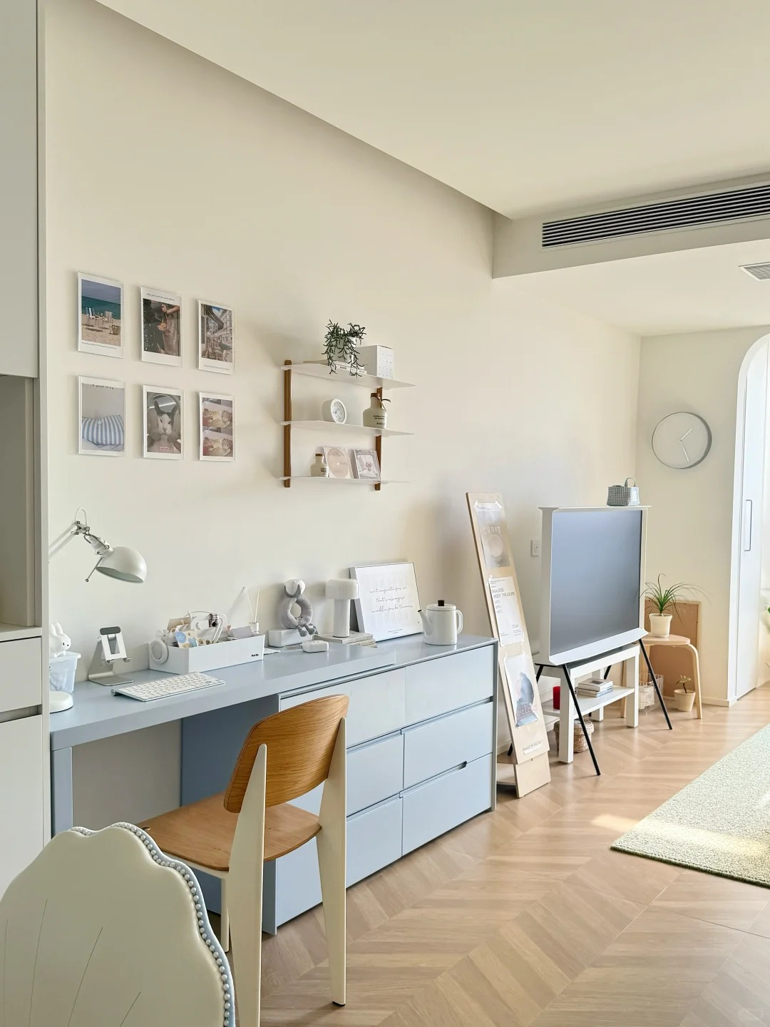 A MOHUE blue storage desk in a calm contemporary room